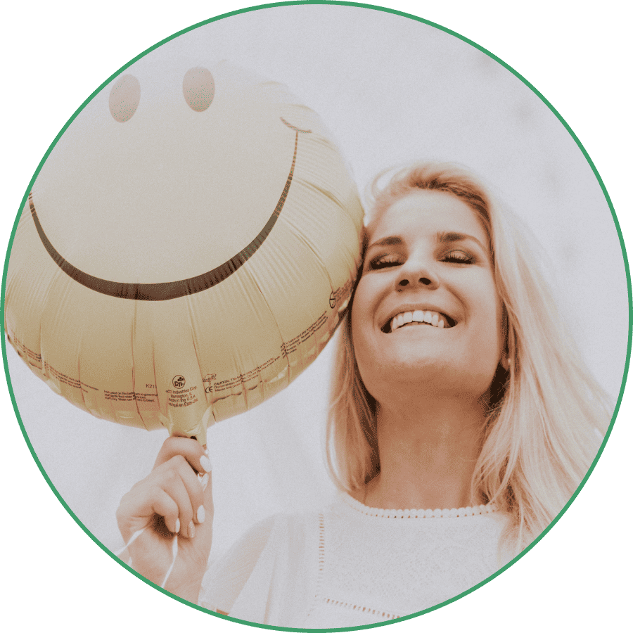 Cynerge Consulting| image: woman-holding-smily-balloon