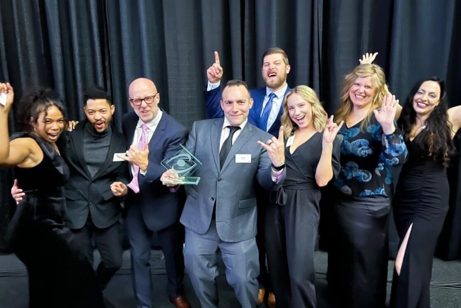 Team Cynerge posing for Michigan Top 50 award