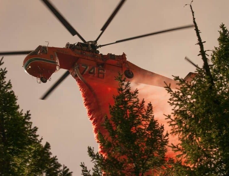 Heavy helicopter drops fire retardant on the Happy Camp Complex Fire in the Klamath National Forest in California, which began on Sep. 17, 2014 from lightening and has consumed 125, 788 acres to date and is 68% contained. U.S. Forest Service photo by Kari Greer.