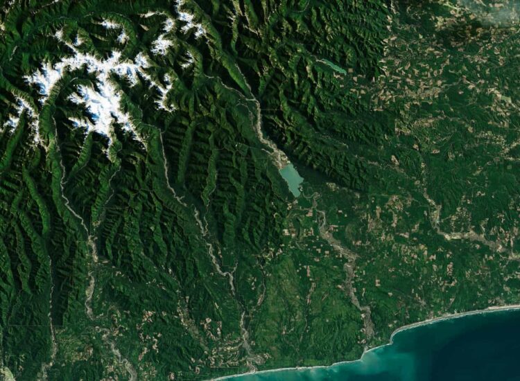 Satellite imagery of federally managed forest and mountain terrain, illustrating the scale and complexity of public land management